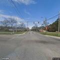 Officer conducts traffic stop on white Lexus
