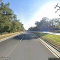 Car stopped in traffic lane on Newberry Road