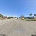 Traffic stop on black pickup at M-50 intersection