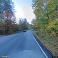 Male slumped in vehicle, unresponsive at Vermont route