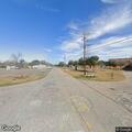 Unresponsive male breathing at street intersection