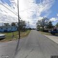 Person with abdominal pain at 14th St in Holly Hill