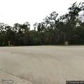 Fire outside structure at Tomoka State Park