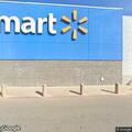 Injury crash involving black Suburban near Walmart