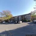 Person experiencing abdominal pain at Castle Hills apartment