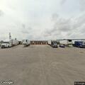 Suspicious person walking in business parking lot
