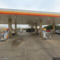Man acting erratically and throwing items at gas station