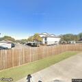 Report of parked car hit by truck in lot