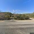 Grass fire reported near building on Highway 83