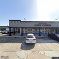 Suspicious man pacing outside furniture store