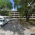 Man sleeping on grass outside sheriff's office
