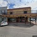 Officers check unsecured upstairs door at business