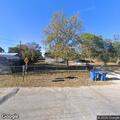 Loose dogs return to yard on Bandera Boulevard