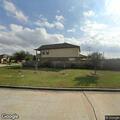 Man banging on front door at Cactus Field Lane home