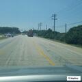 SUV driving without rear lights on Highway 46