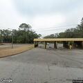 Person in cardiac arrest with head bleeding at car wash