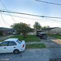 Clothes set on fire on front porch of home