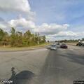 Tree blocking lane on Highway 90 at Live Oak