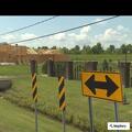 Two-vehicle crash with car in ditch in Meraux