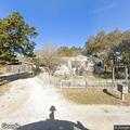 Small brush fire extinguished by homeowner