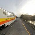 Reckless driving by blue pickup with trailer