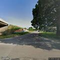 Broken tree limbs blocking Pleasant Run Parkway