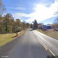 Two-vehicle crash with debris on Route 130 shoulder