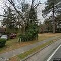 Small burn pile in front yard reported as smoke