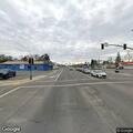 Person with neck pain at Highway 99 and East Spruce St
