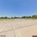 Officer contacts person in parking lot