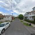 Unconscious woman with shallow breathing in blue car