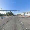 Traffic crash involving blue Dodge minivan