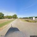 Abandoned car found off road near railroad tracks