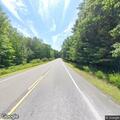 Caller reports erratic black SUV on Route 219