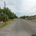 Deceased dog and debris blocking roadway