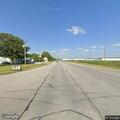Person with extreme abdominal pain in vehicle on highway