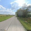 Single-car crash damages road sign on State Highway W