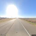Traffic stop on white GMC Denali on K-148