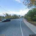 Officer conducts traffic stop on silver Nissan