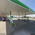 Smoking vehicle at gas station on 14 Mile Road