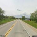 Vehicle hits property and trees, leaves parts behind