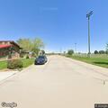 Officer checks suspicious vehicle near ball field