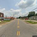 Male found slumped over steering wheel on Main St
