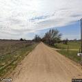Neighbor drives tractor into fence post