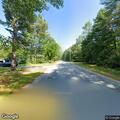 Van fire near other vehicle and wooded area
