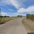 Grass fire reported near West Second and Coker