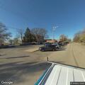 Officer taking auto report on West Washington