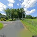 Person experiencing chest pain near school road