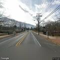 Person located with red bag near South Main Street