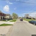 Person down on street near Iowa Street between Argyle and Saxton